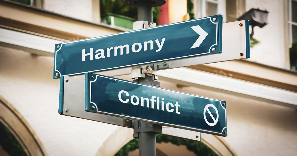 sign with conflict and harmony pointed in different directions